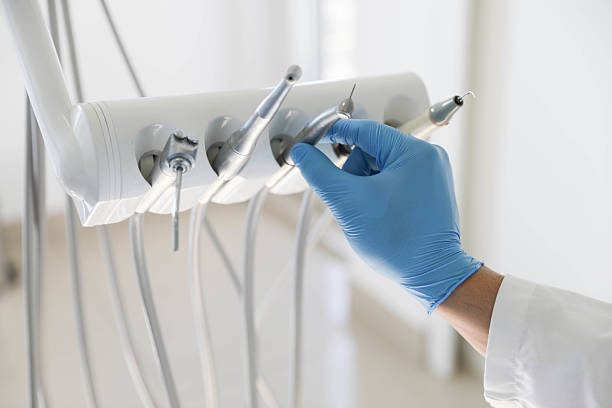 Professional Tooth Extraction technician working in Bossier City, LA